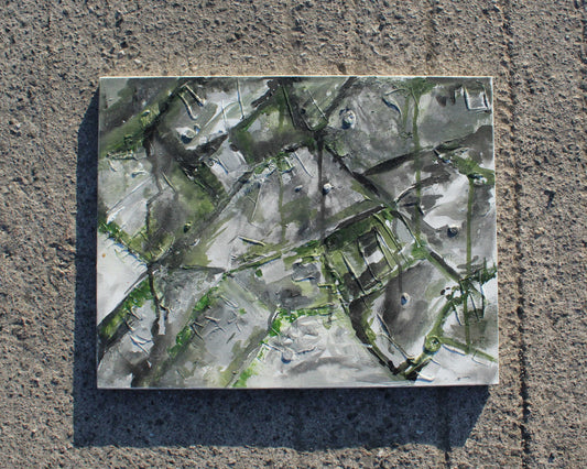 Abstract art piece on a textured surface